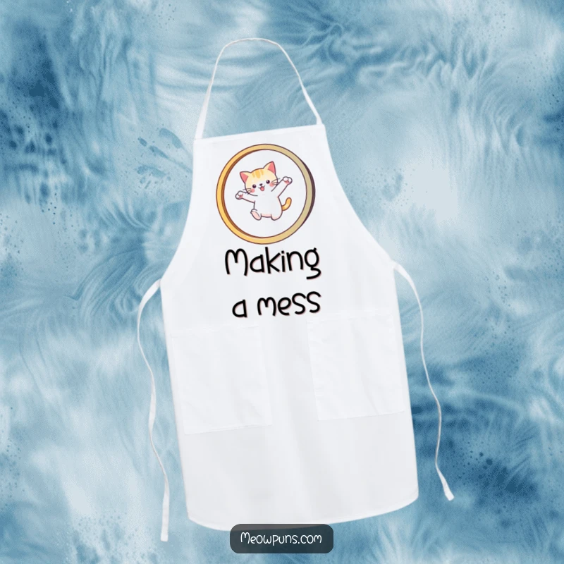 Funny apron depicting a cat leaping through an 'M' hoop, ideal for a cook or artist who appreciates feline agility.
