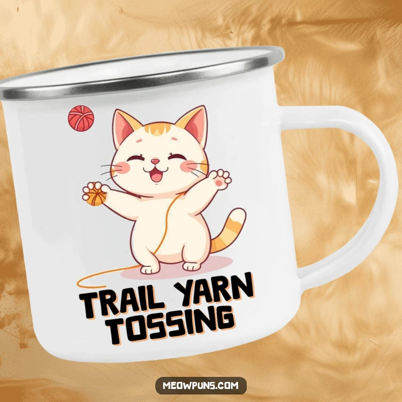 Funny Cat Camping Mug: Sturdy enamel mug featuring a happy cat juggling yarn, perfect for hot or cold drinks outdoors.
