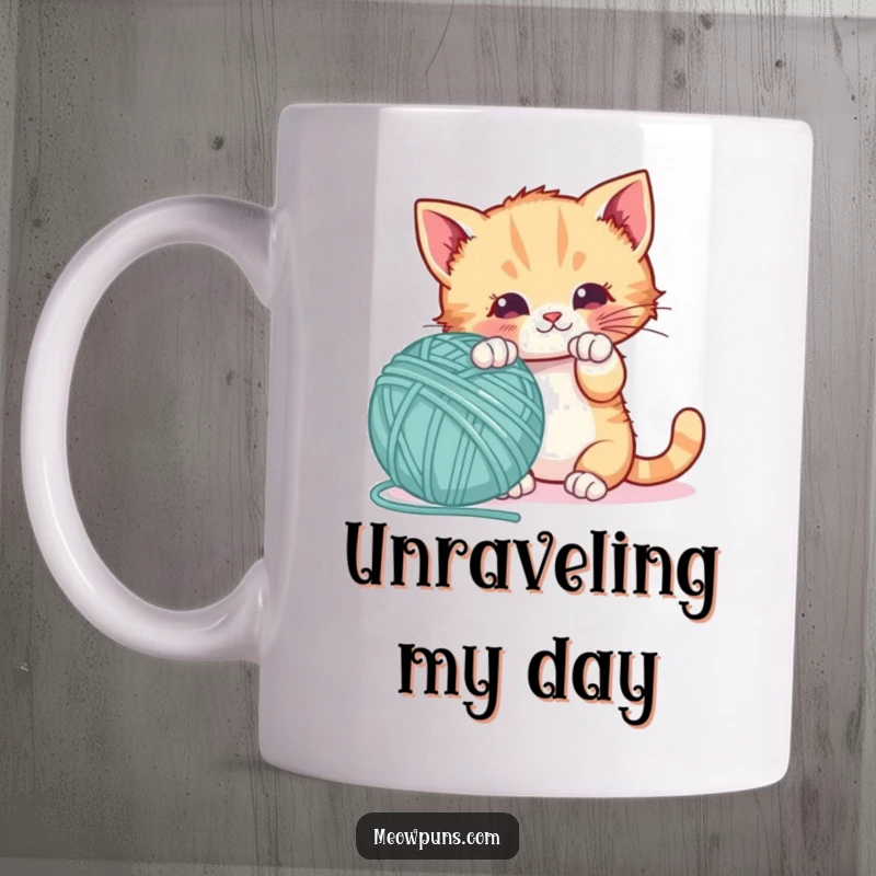 Funny mug with a playful kitten happily batting a large yarn ball shaped like a giant letter, celebrating learning and pets.