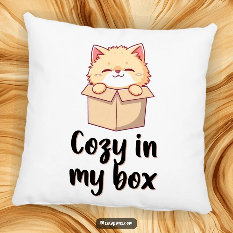 Funny pillow with a fluffy cat character, curiously peeking from a comically small box, for cozy feline humor.