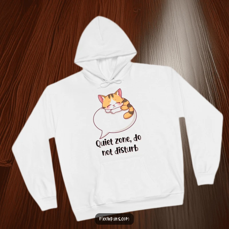 Funny Calico Cat Hoodie, a content cat peacefully naps on a large speech bubble, ideal for cozy, humorous wear.