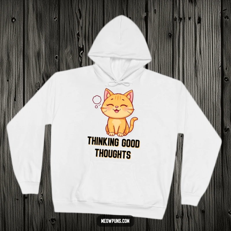 Funny Ginger Cat Hoodie, a happy ginger cat wears a small thought bubble, exuding warmth and happiness.