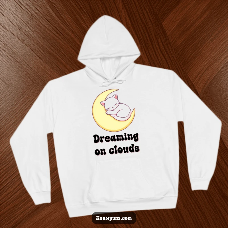 Funny Sleepy Cat Moon Hoodie: A cat naps curled on a moon, offering cozy humor and warmth.