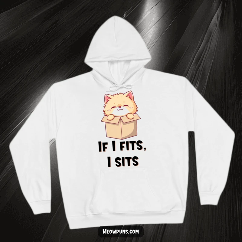 Funny hoodie with a fluffy cat character, curiously peeking out of a comically small box, perfect for cozy humor.