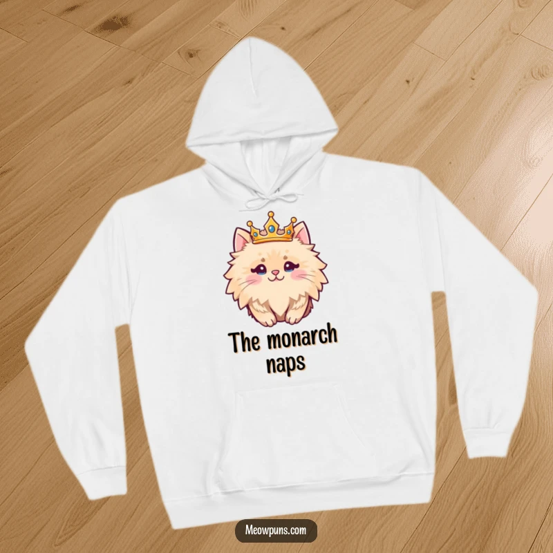 Funny fluffy cat character wearing a crown, designed for cozy warmth and regal style on this hoodie.