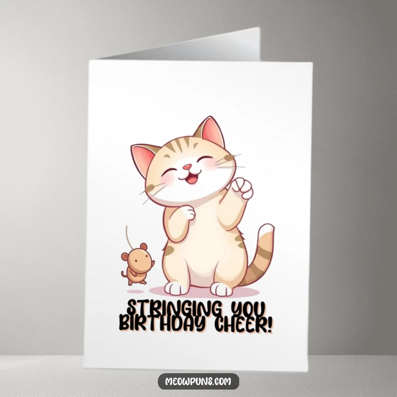 Funny Free Printable Birthday Card: Cat gleefully batting a string with a tiny mouse, hilarious downloadable greeting.