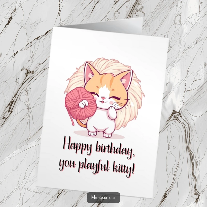Funny free printable birthday card: A cat energetically bats at a huge, fuzzy yarn pom-pom. Warning: extreme cuteness ahead.