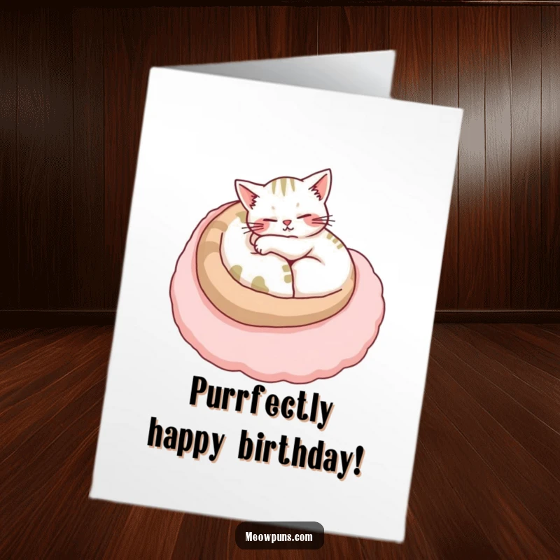 Funny Free Printable Birthday Card: Cat snuggled comfortably on top of a large, soft, plush letter, purring.