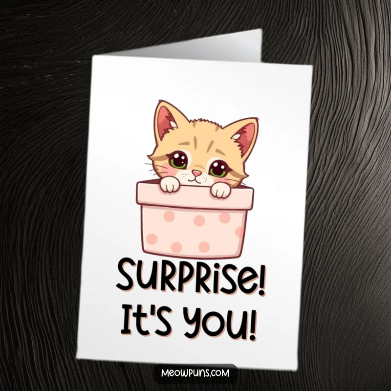 Funny Free Printable Birthday Card: A curious cat peeking playfully out of a brightly wrapped gift box.