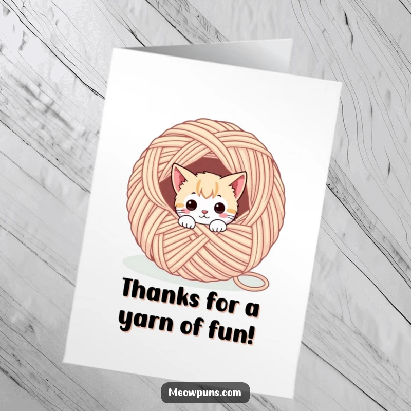 Funny Free Printable Thank You Card: A cute cat character peeking curiously from a huge ball of yarn, saying thanks.