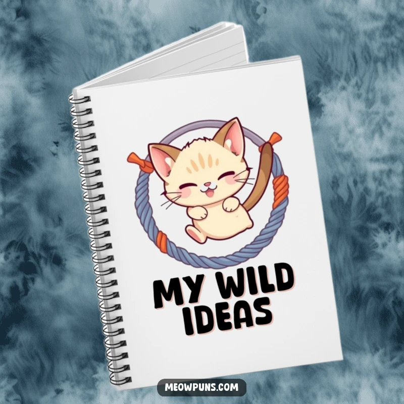 Funny mischievous Siamese cat jumping through a hoop of yarn, on the cover of a lined notebook, inspiring creativity and playfulness.