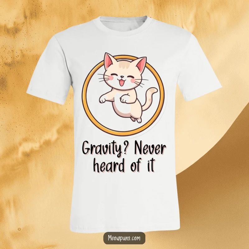 Funny cat t-shirt of a dynamic cat mid-air, expertly leaping through a circular hoop resembling the letter M.