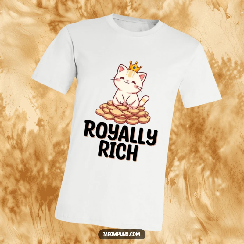 Funny T-shirt featuring a cat wearing a small crown on a heap of fish-shaped coins, embodying regal feline humor.