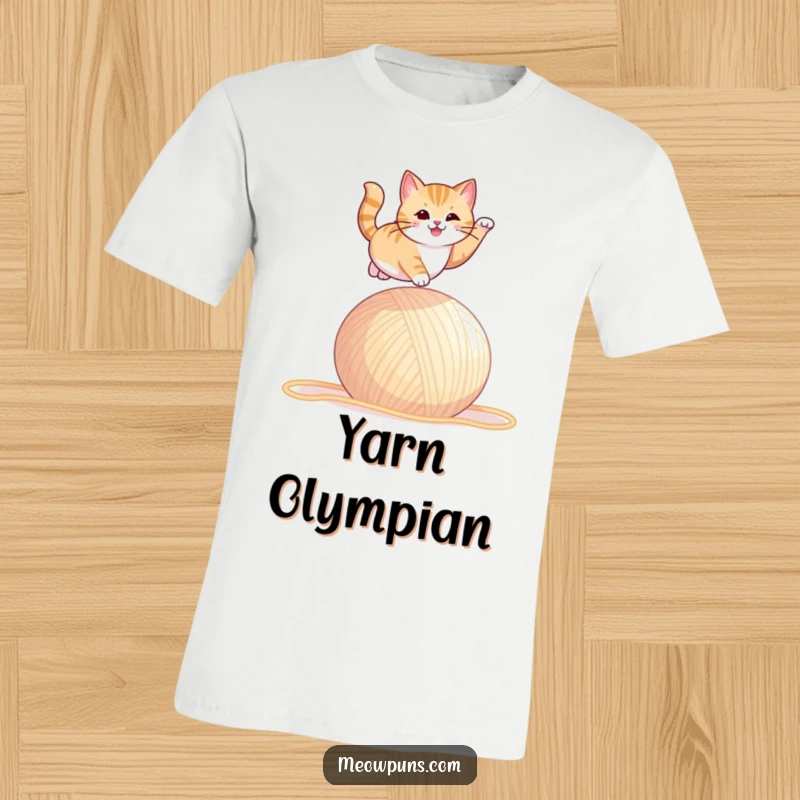 Funny t-shirt featuring a cat in mid-air, leaping dramatically over a huge ball of yarn.